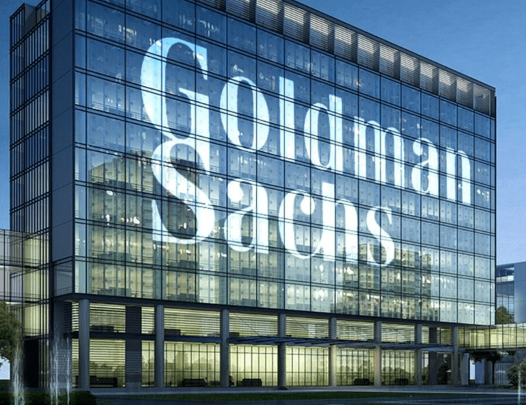 Goldman Sachs urged clients to tread carefully in the red-hot artificial intelligence trade, cautioning that lofty expectations could collide with reality.In a note late Thursday, the bank’s strategists said AI remains a powerful long-term theme but warned that near-term risks are mounting. The concern: a potential cooling in capital spending by big technology firms after a year of aggressive investment in data centers and chips.Goldman Sachs warnings amid the AI investment boomInvestor enthusiasm for artificial intelligence stocks may be nearing its peak, according to Goldman Sachs strategist Ryan Hammond, who sees the sector shifting toward a more demanding phase of scrutiny.Hammond noted that the current AI investment cycle has been powered largely by “hyperscaler” heavyweights like Amazon, Microsoft, Alphabet, Meta and Oracle, which together poured roughly $368 billion into AI-related capex and research in 2025, a record surge.But the strategist warned that this second phase of aggressive buildout may soon give way to a third stage, in which investors look beyond infrastructure spending and demand clearer evidence of earnings gains. The shift underscores the risk that AI valuations, which have already soared on expectations, could face pressure unless companies begin to show near-term financial payoffs.Hammond explained:<blockquote>While we expect the AI trade will eventually transition to Phase 3, investors will likely require evidence of a tangible impact on near-term earnings to embrace these stocks. Unlike Phase 2, there will likely be winners and losers within Phase 3.</blockquote>Investor exuberance over artificial intelligence is showing cracks as Wall Street questions whether corporate earnings can keep pace with the hype.Nvidia stock tumbled almost 6% after investors took a harder look at its guidance, while Salesforce and newly listed Figma also slid when results failed to justify rich valuations.The pullbacks have fueled broader doubts about whether the sector’s meteoric rise can be sustained without clearer signs of near-term profit growth.Risk of a capital expenditure slowdownGoldman Sachs is cautioning that any pullback in artificial intelligence spending by Big Tech could hit markets hard. If the “hyperscaler” companies were to scale back capital investment to 2022 levels, a scenario Goldman labeled “extreme,” the impact could be severe. The firm estimates such a retreat would wipe out roughly 30% of the $1 trillion in S&P 500 sales growth projected for 2026. That, in turn, could compress valuation multiples by 15% to 20%, dealing a heavy blow to AI-linked shares and broader equity benchmarks.Goldman Sachs noted that while valuations for leading tech companies remain elevated, they are still well below the extremes of past market bubbles. The firm highlighted that the five largest US technology stocks currently trade at roughly 28 times earnings, compared with a 40x multiple at the height of 2021’s rally and about 50x during the dot-com era in 2000.Goldman credited this relative restraint to the substantial real earnings now being generated, largely supported by hyperscaler capital investment in AI infrastructure. The bank suggested that unlike previous speculative cycles, today’s valuations are underpinned by stronger fundamentals, though risks remain if spending growth slows.The post <a href="https://invezz.com/news/2025/09/05/goldman-sachs-sounds-alarm-on-ai-bubble-risk-why-analysts-are-worried/">Goldman Sachs sounds alarm on AI bubble risk: why analysts are worried</a> appeared first on <a href="https://invezz.com/">Invezz</a>